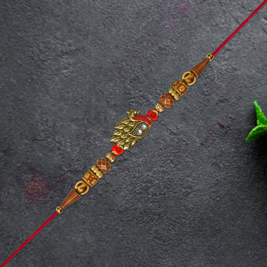 Antique Peacock Feather Rakhi With Beaded Thread