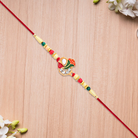 Divine Ganpati Rakhi With Enamel Work And Traditional Beads