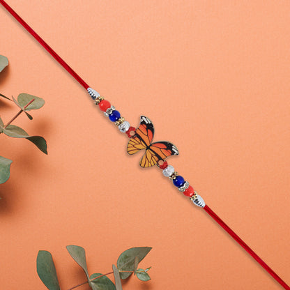 Vibrant Butterfly Rakhi With Colorful Beads  Red Mauli Thread