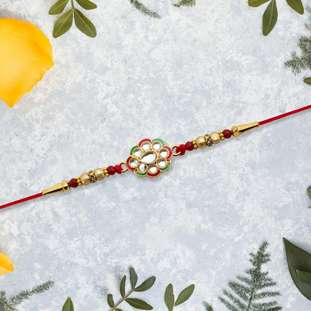 Kundan Work Floral Rakhi With Red Thread