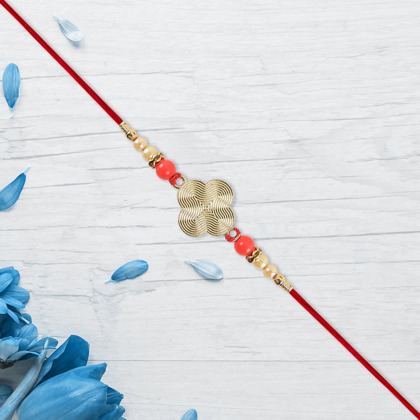 Rakhi With Multicolor Beads  Silver Accents On Red Thread