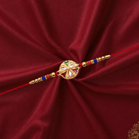 Designer Floral Rakhi With Mirror Work  Colorful Beads On Red Thread