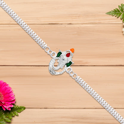 Stylish Ganesha Rakhi With Enamel Highlights And Silver Metal Chain