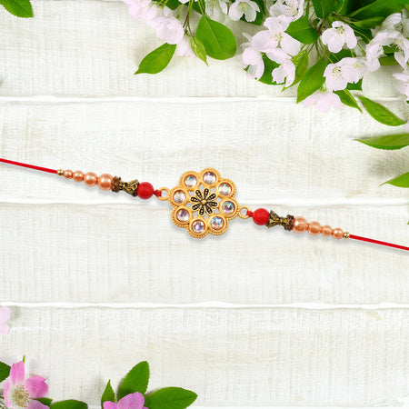 Gold-toned Floral Rakhi With Pink Stones